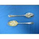 Two near matched pair of George III silver Berry Spoons, one by Hester Bateman, hallmarked London,