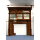 An impressive early 20thC Art Nouveau style inlaid oak Fire Surround, the whole ornately inlaid with