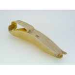 A Japanese Ivory okimono model of a Banana, Meiji period (1868-1912), partially peeled, damaged, 6?