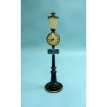 A Le Coultre "Rue de la Paix" Lamp Clock, the black enamelled metal and brass street-lamp style base