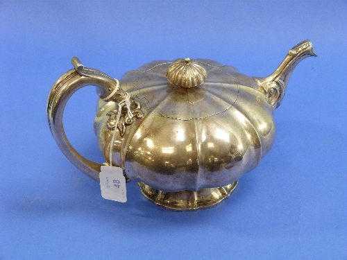 A George IV Irish silver Tea Pot, by William Nolan, hallmarked Dublin, 1829, of segmented melon