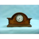 An Edwardian inlaid oak Mantel Clock, by Mappin and Webb, flanked by gilt metal pilasters upon