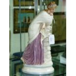 A Royal Worcester porcelain figure, of a contemplative woman, with lustre decoration, 11in (28cm)