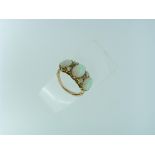 A good opal and diamond Ring, the three graduated oval opals with three diamonds between, all