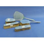 A five piece silver and light-blue enamel Dressing Table set, hallmarked Birmingham, 1913,