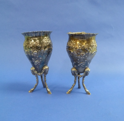 A matched pair of Continental silver Vases, import marks for Birmingham 1909 and Sheffield 1893,