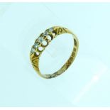 A small five stone graduated diamond Ring, all mounted in 18ct yellow gold, Size Q½.