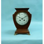 An Edwardian inlaid mahogany shield shaped Mantel Clock, the eight day movement striking on a