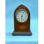 An Edwardian inlaid mahogany Mantel Clock, Swiss made, with pointed arched top, upon gilt metal