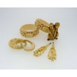 A pair of Chinese carved ivory Napkin Rings, Qing dynasty, early 20thC, 2in (5cm) diameter, together