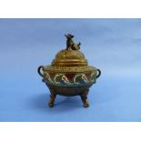 An antique Oriental bronze Censer, of two-handled ovoid form with panels of cloisonné decoration,