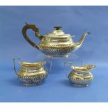 A George V silver three-piece Tea Service, by Mappin & Webb, hallmarked Sheffield, 1911, of ovoid