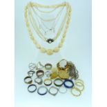 A small collection of Jewellery, comprising a collection of various rings, in various metals, a gilt