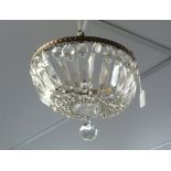 A Chandelier/Pendant-light Shade, formed of swags of glass drops from a circular gilt metal frame.