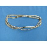 A long silver Chain, formed of flattened oval links, 31½in (80cm) long, 1.58ozt.