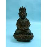 A Chinese bronze seated figure of a Bodhisattva, and stand, late Ming, 16th / 17th century, 12?in (