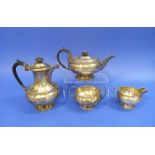 A George V silver four piece Tea and Coffee Set, by Walker and Hall, hallmarked Sheffield, 1927,