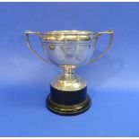 A George V silver two-handled Trophy Cup, London Hallmarks, 1931, with inscription and ebonised