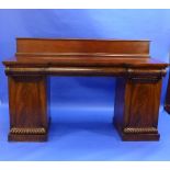 A William IV mahogany breakfront twin pedestal Sideboard, with three blind frieze drawers above