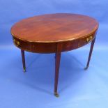 An Edwardian mahogany oval Centre Table, with four frieze drawers each labelled with inlaid letters,