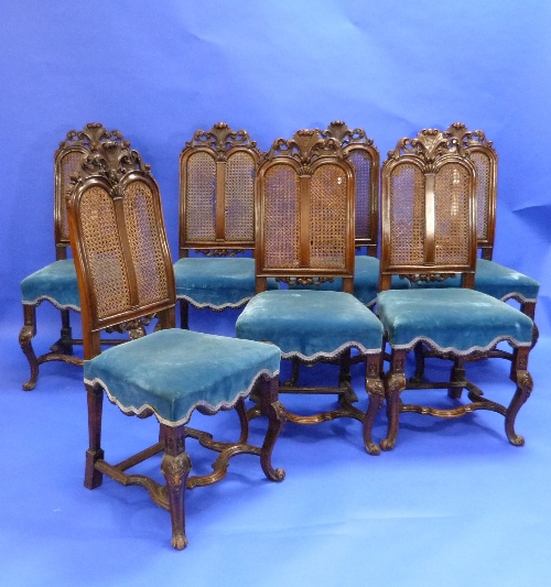 Seven antique continental carved walnut Dining Chairs, some marked 'E. Campbell' on the frame,