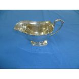 A George V silver Sauce Boat, by Deakin & Francis Ltd., hallmarked Birmingham, 1935, of plain helmet