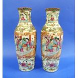 A 19thC pair of Canton famille rose Vases, of slender baluster form, decorated in coloured enamels