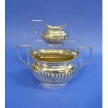 An Edwardian silver Sugar Bowl and Cream Jug, by A C Jackson & co., hallmarked Birmingham, 1909,