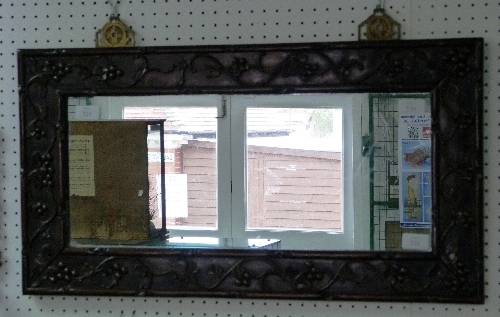 An early 20thC Chinese hardwood framed Wall Mirror, of rectangular form with brass mounting