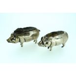 An Edwardian silver novelty Pin Cushion, in the form of a pig, by Adie & Lovekin Ltd., hallmarked