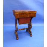 A Victorian burr walnut serpentine front Games and Sewing Table, the sewing compartment with red