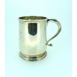 A late Victorian silver Christening Mug, hallmarked London, 1900, with scroll handle, and