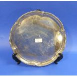 An Edwardian silver Silver, hallmarked London, 1901, of lobed circular form, with gadrooned and