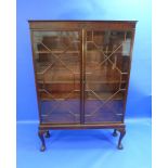 A 19thC mahogany Bookcase, the rectangular top above two astragal glazed doors enclosing three