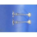 A George V pair of silver Trumpet Vases, hallmarked Sheffield, 1927, each with a wavy rim and