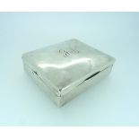 An Edwardian silver Cigarette Box, by Mappin & Webb, hallmarked London 1907, of hinged rectangular