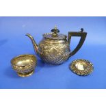 A Victorian silver Teapot, hallmarked London, 1896, of globular form, chased with floral and