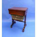 An early 19thC rosewood Games/Sewing Table, the rectangular folding top with tooled red leather