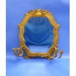 An antique giltwood framed gadroon shaped girandole Mirror, the frame with textured surface,