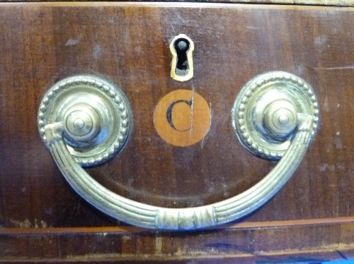 An Edwardian mahogany oval Centre Table, with four frieze drawers each labelled with inlaid letters, - Image 2 of 2