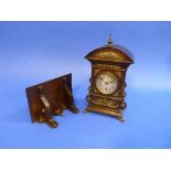 An early-20thC continental walnut Bracket timepiece and bracket, with gilt-metal mounts, movement