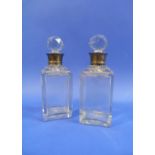 A pair of Edwardian silver-mounted cut-glass Decanters, by Hukin & Heath, hallmarked Birmingham,