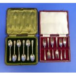 A cased set of six silver Cake Forks, hallmarked Sheffield, 1944, together with a cased set of