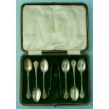 A cased set of six Tea spoons and Sugar Nips, by Mappin & Webb, hallmarked Sheffield, 1912, of