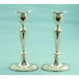 A pair of Elizabeth II silver Candle Sticks, hallmarked Sheffield 1964, of ovoid form with vase