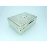 A George V silver Cigarette Box, hallmarked Birmingham, 1913, of hinged rectangular form, the lid