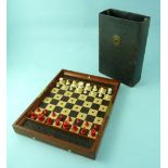 An early 20thC Jaques & Son Travelling Chess Set, the hinged mahogany case enclosing thirty-two