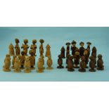 A Nigerian carved thorn Chess Set, probably by A. Orisadipe, with pieces shaped as missionaries,