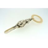 A silver, faux ivory and mother of pearl Baby's Teething Rattle, hallmarked Birmingham, 1970, in the