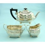 A near matched George V silver three-piece Tea set, the teapot and sugar bowl hallmarked